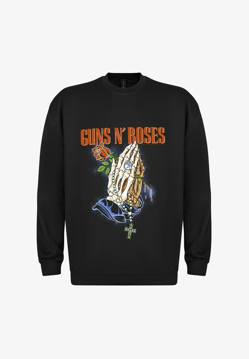 Felpa nera con un design grafico di una mano scheletrica con una rosa, perline e una croce, con il testo "GUNS N’ ROSES" in arancione.