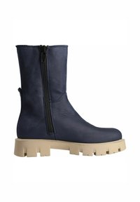 Navy blue mid-calf boot with side zipper and beige thick treaded sole, smooth leather texture.