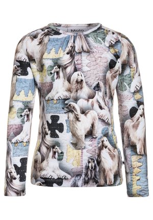 Chemise à manches longues avec une texture matelassée, fabriquée en tissu doux avec un motif de chien multicolore sur un fond bleu clair.