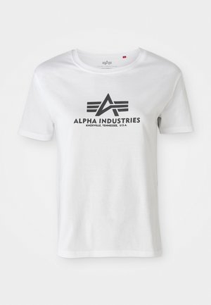 Short-sleeve white cotton t-shirt featuring a black printed logo with wings and “ALPHA INDUSTRIES” text, round neck design, and relaxed fit.