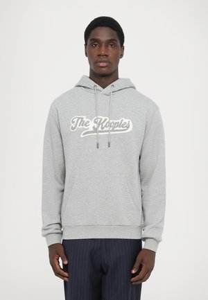Grauer Hoodie mit einer vorderen Kängurutasche, Kapuze mit Kordelzug und großem weißen Schriftzug "The Kooples". Mit gerippten Bündchen und Saum.