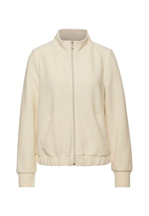 Crème-kleurige ritsjack, gemaakt van textuurstof, met een hoge kraag, ribgebreide manchetten, zijzakken en een relaxed fit.