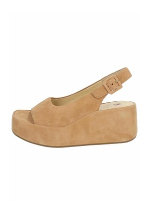Beige suede wedge sandals with a peep-toe design, a slingback strap, and a square buckle. Features a thick platform.