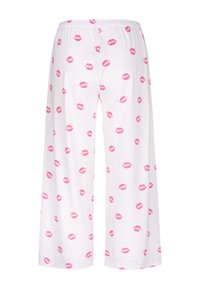 White pajama pants with an elastic waistband, featuring a pattern of pink lips scattered throughout. Made from soft, lightweight fabric.