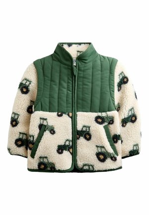 Kinderjacke mit grünen, gesteppte Schultern und cremefarbenem Sherpa-Fleece-Körper und Ärmeln mit Traktormuster, Fronttaschen und Stehkragen.