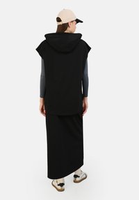 Modanisa BENIN SET - Maxi sukně - black