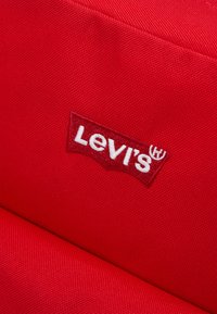 Levi's® LEVI'S® L PACK STANDARD BACKPACK UNISEX - Mochila - dull red