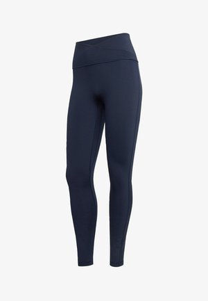 Granatowe legginsy z wysokim stanem i zakładanym paskiem, dopasowane, sięgające do kostek, z płaskimi szwami.