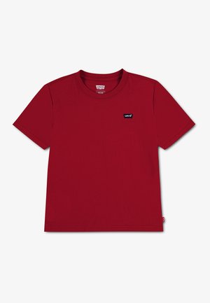 T-shirt Levi's rouge à manches courtes, col rond et petite étiquette avec logo Levi's sur la poitrine gauche, sur fond blanc uni.