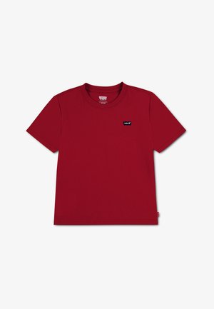 T-shirt Levi's rouge à manches courtes, col rond et petite étiquette avec logo Levi's sur la poitrine gauche, sur fond blanc uni.