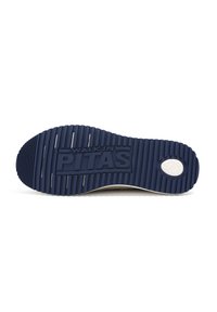 Navy rubber outsole with vertical grooves and circular logo. "WALK IN PITAS" embossed in the center. Smooth, curved transition to upper.