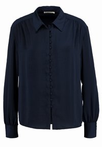 Camisa de manga larga azul marino hecha de tela suave, con cierre de botones en el frente, cuello suave y mangas ligeramente abullonadas.