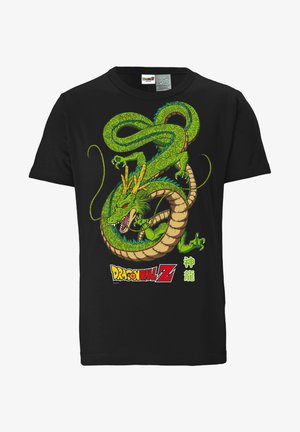 T-shirt en coton noir présentant un graphique de dragon vert vibrant avec des détails complexes, des yeux rouges et le logo "Dragon Ball Z" en jaune et blanc.