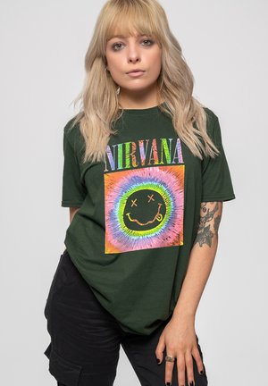 Dark green cotton T-shirt featuring a colorful round logo with a smiling face and the word "NIRVANA" in block letters above.