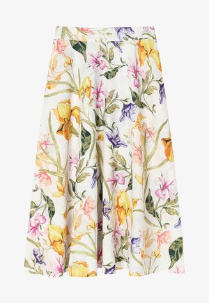 Floral skirt in light fabric featuring multi-colored flowers in purple, yellow, pink, and green on a white background; flared design.