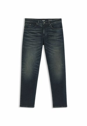Jean slim bleu foncé avec légère décoloration sur les cuisses, poches avant et fermeture par bouton et fermeture éclair à la taille.