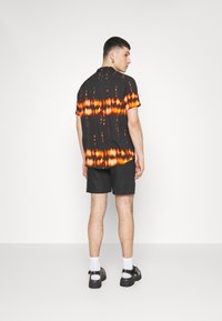 Weekday OLSEN REGULAR - Shorts - black