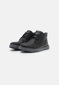 Skechers PROVEN - Botines con cordones - black