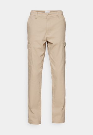 Beige cargo pants made of durable fabric, featuring multiple side pockets, a classic fit, and straight legs with simple stitching.