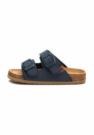 Sandali blu navy con due cinturini regolabili a fibbia, soletta in sughero e suola in gomma testurizzata. Design minimalista senza motivi decorativi.