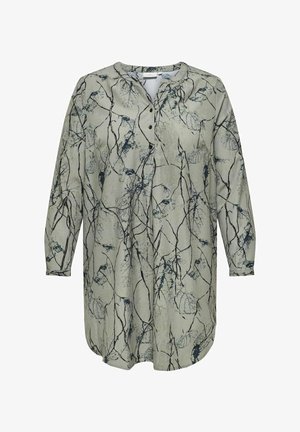 Srajca z dolgimi rokavi v svetlo zeleni tkanini z botaničnim potiskom v temno modri barvi. Ima gumbasto zapiranje spredaj in zaobljen rob.