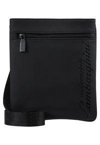 Černá crossbody taška s hladkým matným povrchem, disponující zipovým uzávěrem a embosovaným logem "Lamborghini". Součástí je nastavitelné ramenní popruhy.