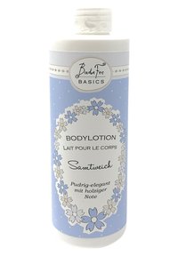 Body lotion in a white bottle with blue floral design. Features a flip-top cap. Text includes "Bodylotion" and "Samtweich."