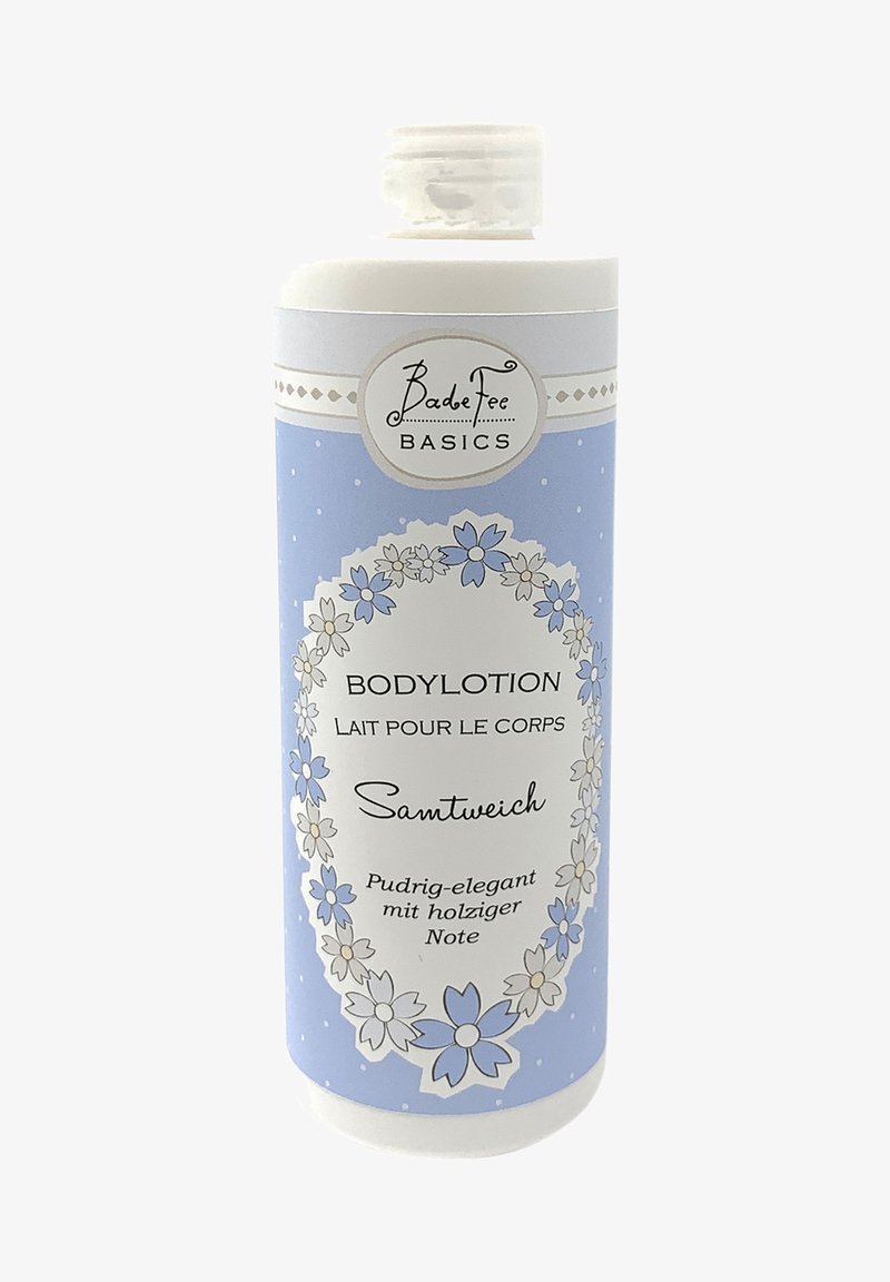 Body lotion in a white bottle with blue floral design. Features a flip-top cap. Text includes "Bodylotion" and "Samtweich."