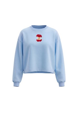 Lyseblå cropped sweatshirt med lange ærmer, ribkanter ved ærmer og hals, med en lille rød og beige broderet figur på brystet.