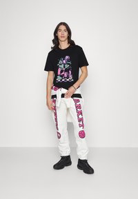 Volcom MAX LOEFFLER  - T-shirt estampada - black