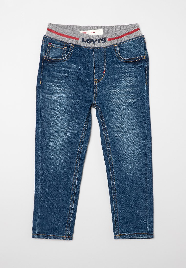 Jeans de mezclilla azul con una cinturilla elástica gris, que presentan acentos rojos y azules. Corte recto, diseño de cinco bolsillos y un ligero desvanecimiento.