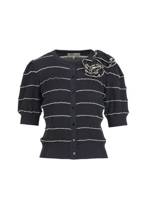 Black short-sleeve cardigan with horizontal white stripes, button front, and decorative fabric flower on the upper left shoulder.