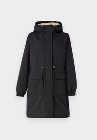 Parka nera con cappuccio, caratterizzata da un rivestimento in pelliccia sintetica, due tasche frontali, polsini elasticizzati e vita regolabile con cordino.