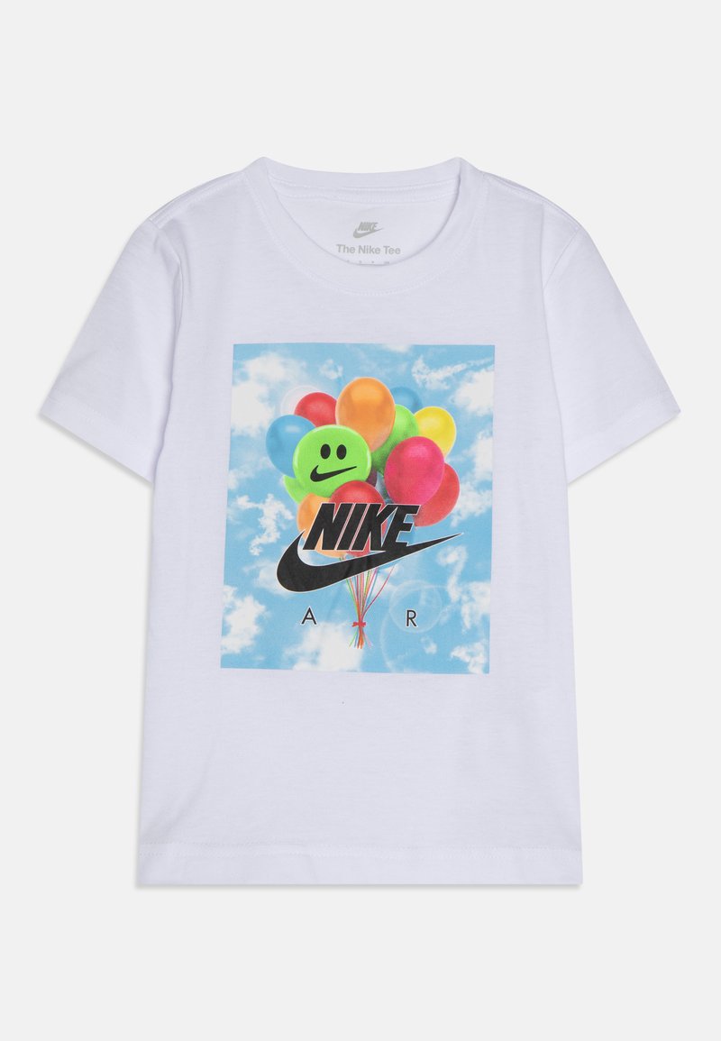 Witte katoenen t-shirt met een graphic van gekleurde ballonnen met een glimlachend gezicht en het Nike-logo. Korte mouwen en een ronde hals.