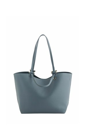 Blaue Leder-Shopper-Tasche mit zwei langen Griffen und weit geöffnetem oberen Bereich, verziert mit goldfarbenen Metallakzenten.