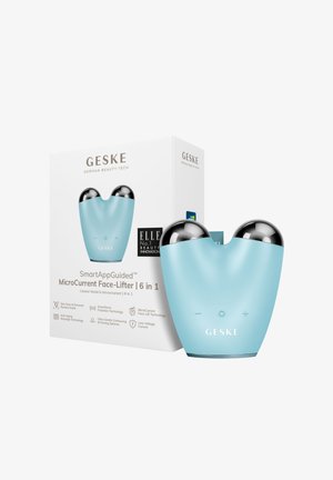 Appareil Blue Geske MicroCurrent Face-Lifter avec deux sphères argentées à côté de sa boîte produit blanche présentant le logo de la marque et des icônes technologiques.
