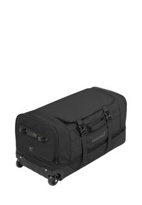 Schwarze Rolltasche mit Stoffaußenbereich, doppelten Seitengriffen, Reißverschluss oben und Logo auf der Vorderseite. Verfügt über robuste Räder für den Transport.