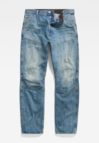Ljusblå denimjeans i rak modell, synlig blekning, knäflickar, fem fickor samt knäppning med knapp och dragkedja.