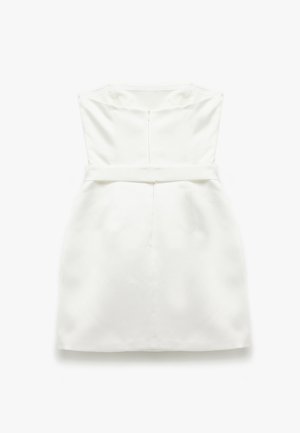 Witte jurk met een aansluitende lijf, peplum taille en een verborgen rits aan de achterkant. Gladde stof zonder zichtbare patronen of accenten.