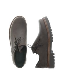 Braune Lederschuhe mit runder Spitze, Schnürdesign, strukturiertem Zungenbereich und dicker Gummisohle mit Rillen. Verstärkter Näht entlang der Kante.