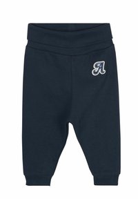 Navyblaue Baumwoll-Jogginghosen mit geripptem Bund und Bündchen. Mit einem gestickten Buchstaben 'A' auf der linken Vorderseite.