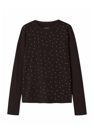 Chemise noire à manches longues côtelée avec de petits pois blancs répartis uniformément sur le devant et un col rond.