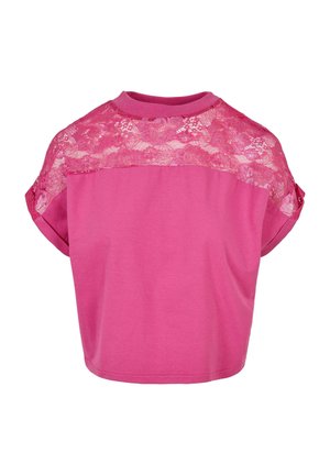 Rózsaszín, rövid ujjú felső, csipkés panellel a vállaknál, kerek nyakkivágással és laza szabással. Sima textúra és könnyű anyag.