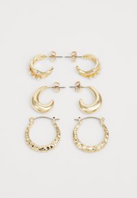 Selezionato, gold-coloured