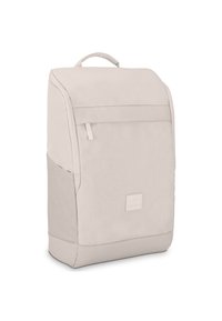 Light beige backpack with a structured design, flat front pocket, top handle, and a smooth, soft texture. Features a logo patch on the front.