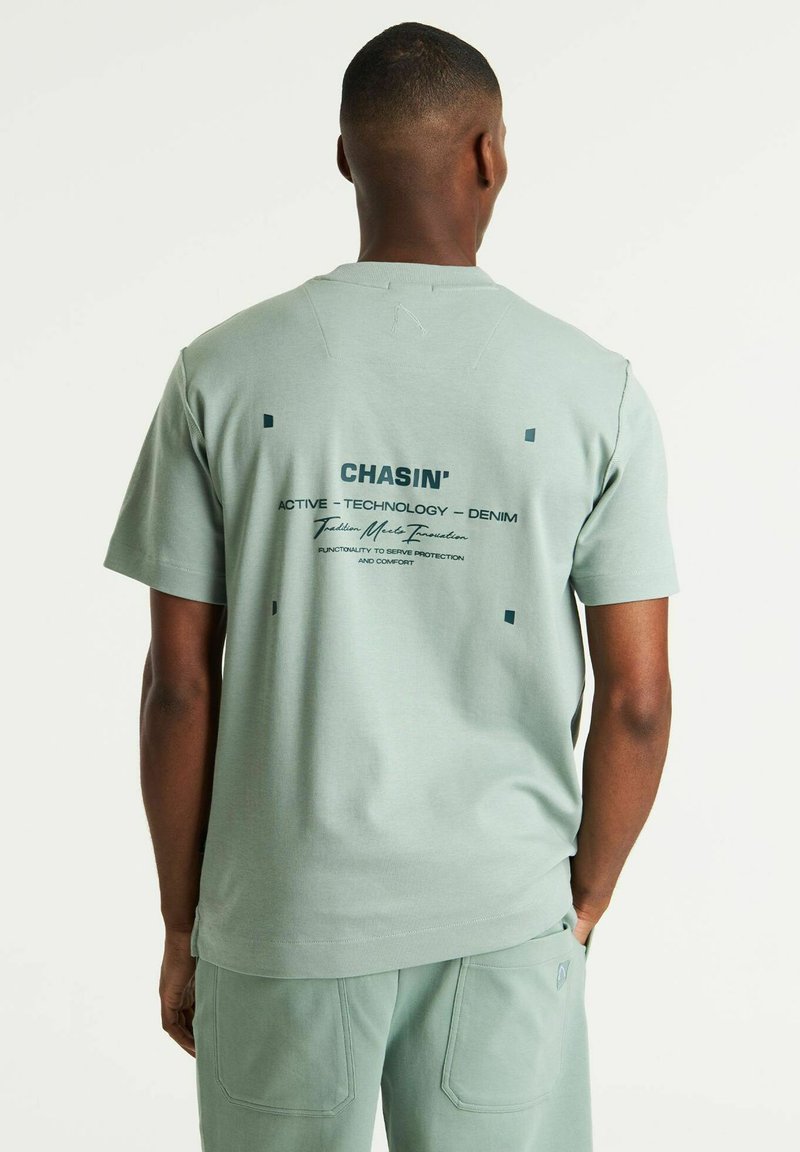 CHASIN' - DRACO LIGHT - T-shirt con stampa - light green, Ingrandire