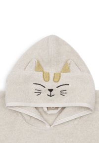Crème-kleurige capuchonhanddoek met een ontwerp van een kattengezicht, met gestikte snorharen, oren in het geel en een textuur die absorberend is.