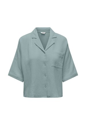 Helesinine lühikeste varrukatega särk mustrilise kangaga, sälkkaelusega, ees nööpidega ja ühe rinnataskuga.