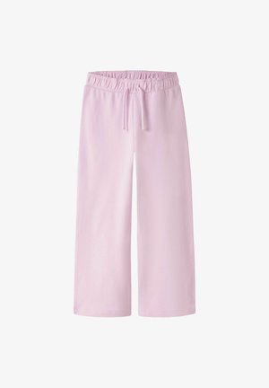 Jasnoróżowe spodnie o szerokich nogawkach z elastycznym paskiem i sznurkiem, wykonane z miękkiego materiału.