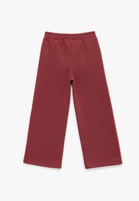 Røde sweatpants med en afslappet pasform, elastisk talje og lige ben. Fremstillet af blødt materiale, der har en glat tekstur og ingen synlige mønstre.